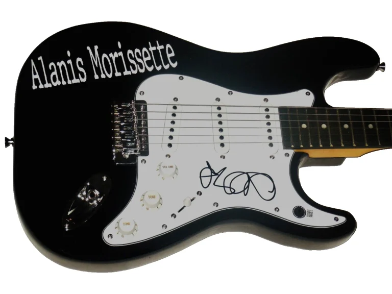 ALANIS MORISSETTE AUTOGRAPHED GUITAR (SINGER / SONGWRITER) - BECKETT COA!