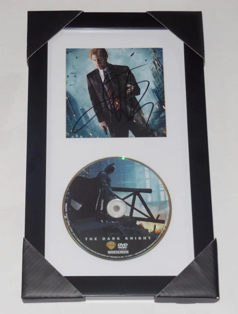 AARON ECKHART AUTOGRAPHED THE DARK KNIGHT DVD DISPLAY (FRAMED & MATTED) - BATMAN