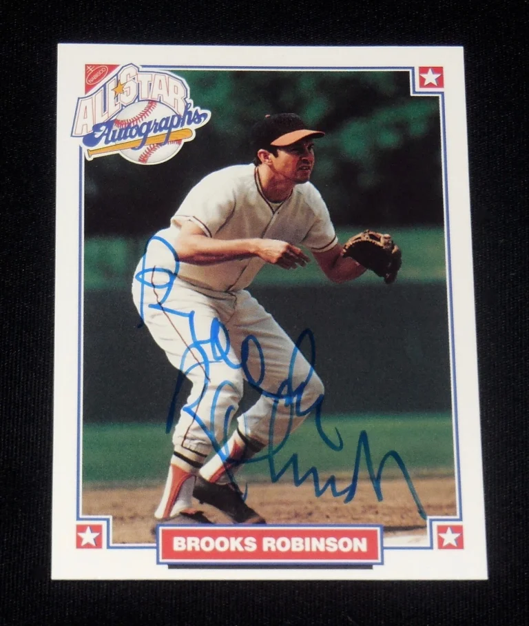 BROOKS ROBINSON AUTOGRAPHED NABISCO BASEBALL CARD (BALTIMORE ORIOLES)
