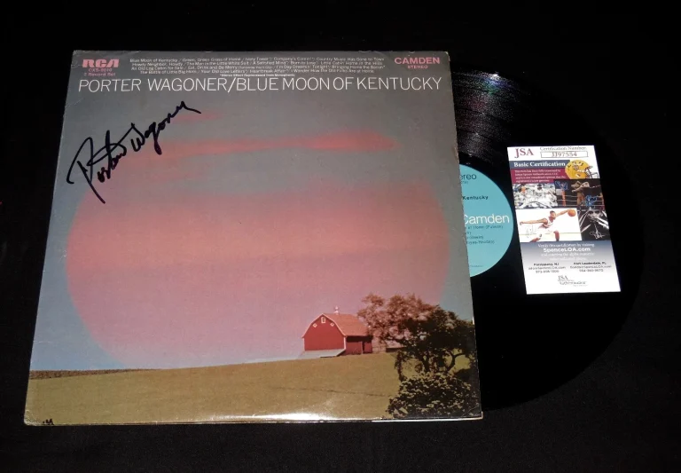 PORTER WAGONER AUTOGRAPHED VINYL RECORD ALBUM (BLUE MOON OF KENTUCKY) - JSA COA!