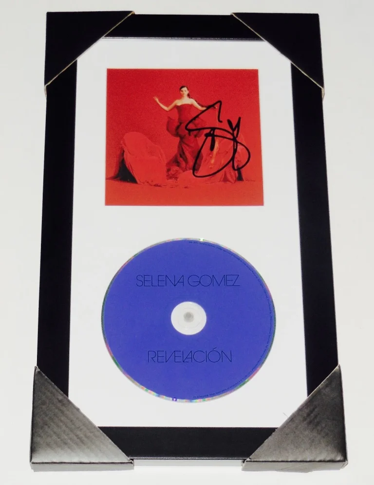 SELENA GOMEZ AUTOGRAPHED REVELACION CD COVER (FRAMED & MATTED) - W/ COA!