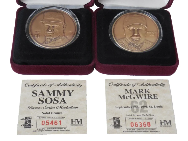LOT 2 HIGHLAND MINT BRONZE COINS - MARK MCGWIRE & SAMMY SOSA - 62 HOMERUN CHASE!