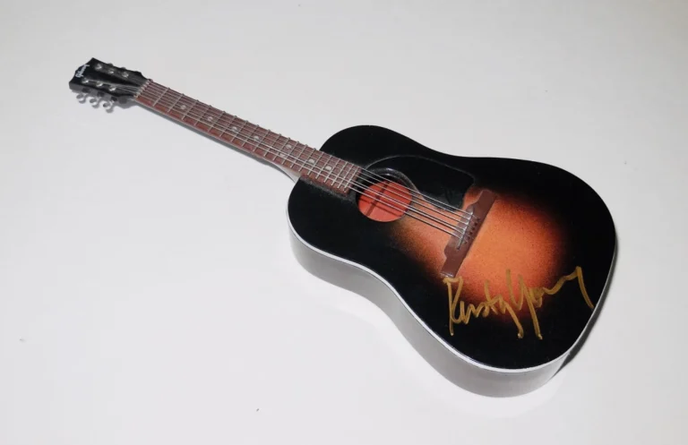 RUSTY YOUNG AUTOGRAPHED MINIATURE ACOUSTIC GUITAR (POCO) - BECKETT COA!