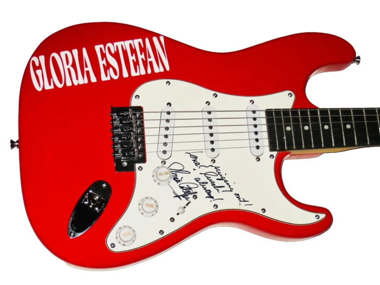 GLORIA ESTEFAN  AUTOGRAPHED ELECTRIC GUITAR (MIAMI SOUND MACHINE) - W/ COA!