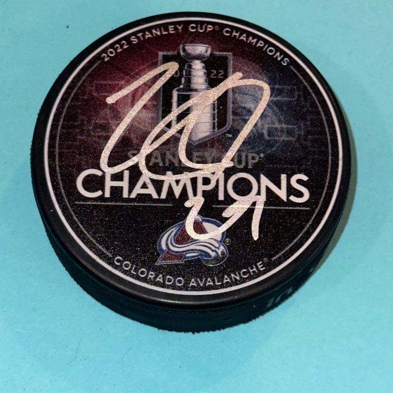 NATHAN MacKINNON (Avalanche) Signed 2022 STANLEY CUP CHAMPS Puck Beckett BAS