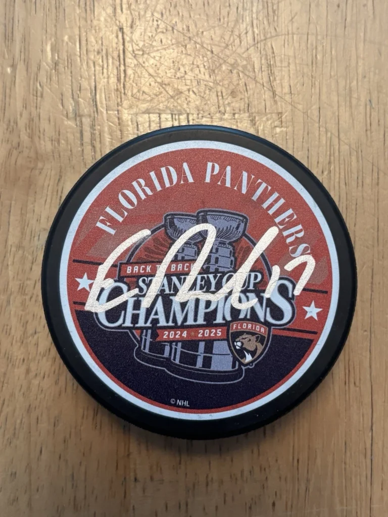 Evan Rodrigues SIGNED Autographed Florida Panthers 25’ SC CHAMPIONS PUCK JSA COA
