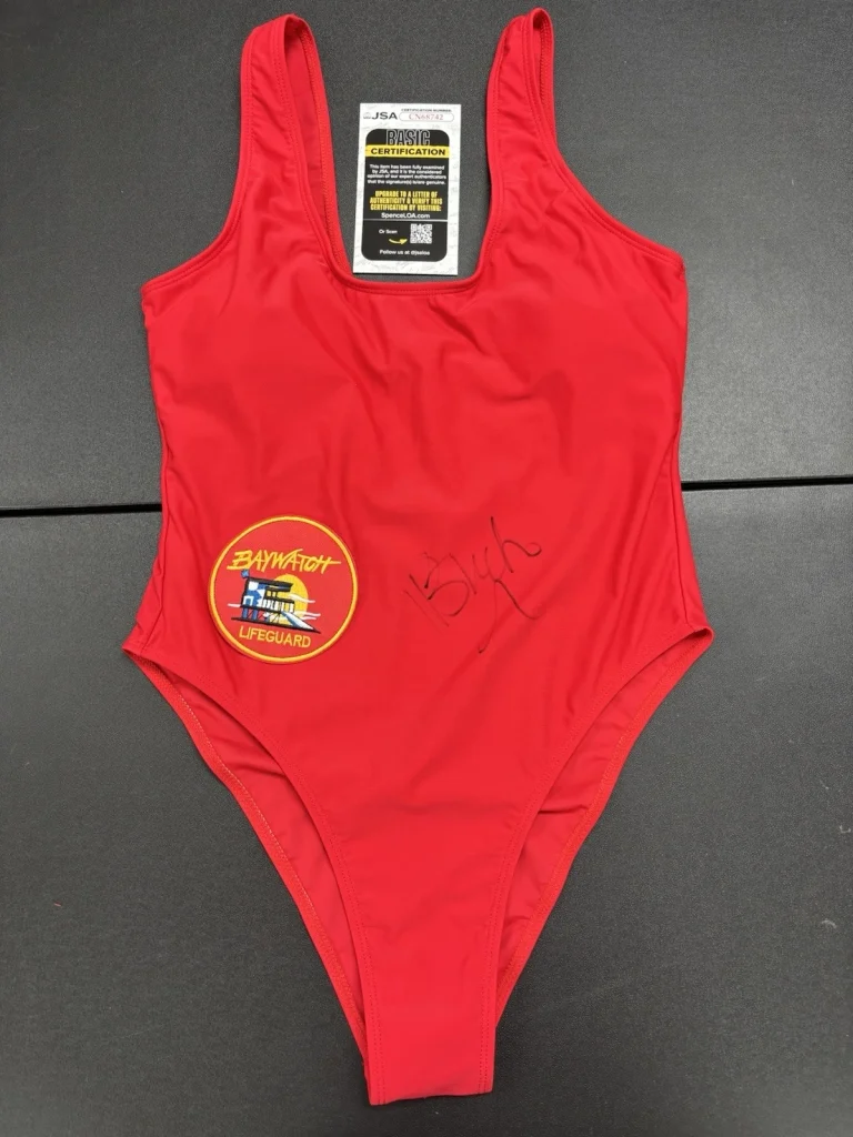 Brooks Nader Signed Autographed Baywatch Swimsuit Selene. JSA Coa