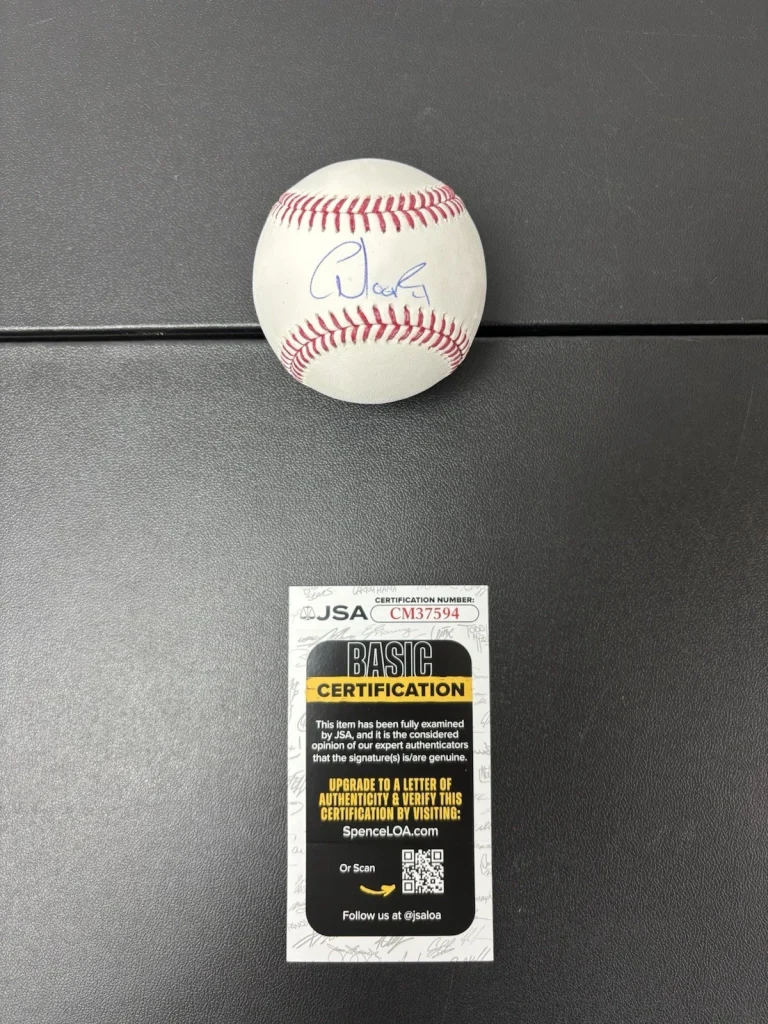 Christian Moore Autographed Rawlings OMLB Baseball. JSA Coa. Los Angeles Angels