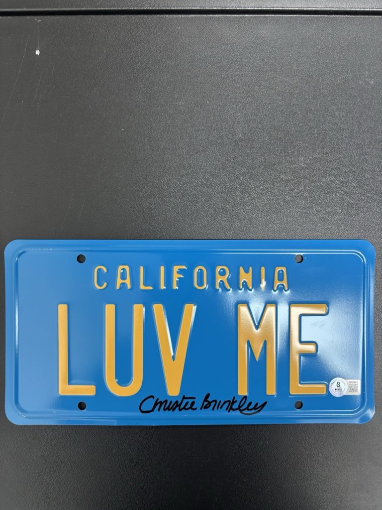 Christie Brinkley Signed Autograph Vacation License Plate Beckett BAS LUV ME