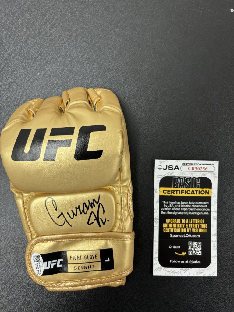 Guram Kutateladze SIGNED AUTOGRAPHED Gold UFC GLOVE. JSA Coa