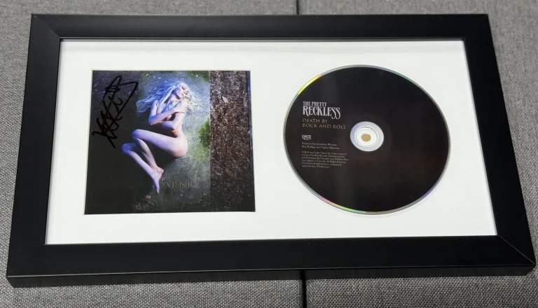 TAYLOR MOMSEN SIGNED FRAMED CD DEATH BY ROCK AND ROLL AUTOGRAPH AUTHENTIC COA
