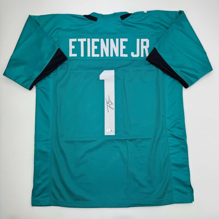 Autographed/Signed Travis Etienne Jr. Jacksonville Teal Jersey Beckett COA
