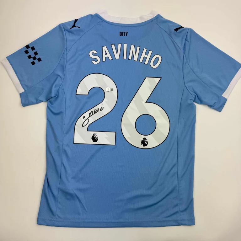 Autographed/Signed Savinho Manchester City Blue Jersey Beckett BAS COA