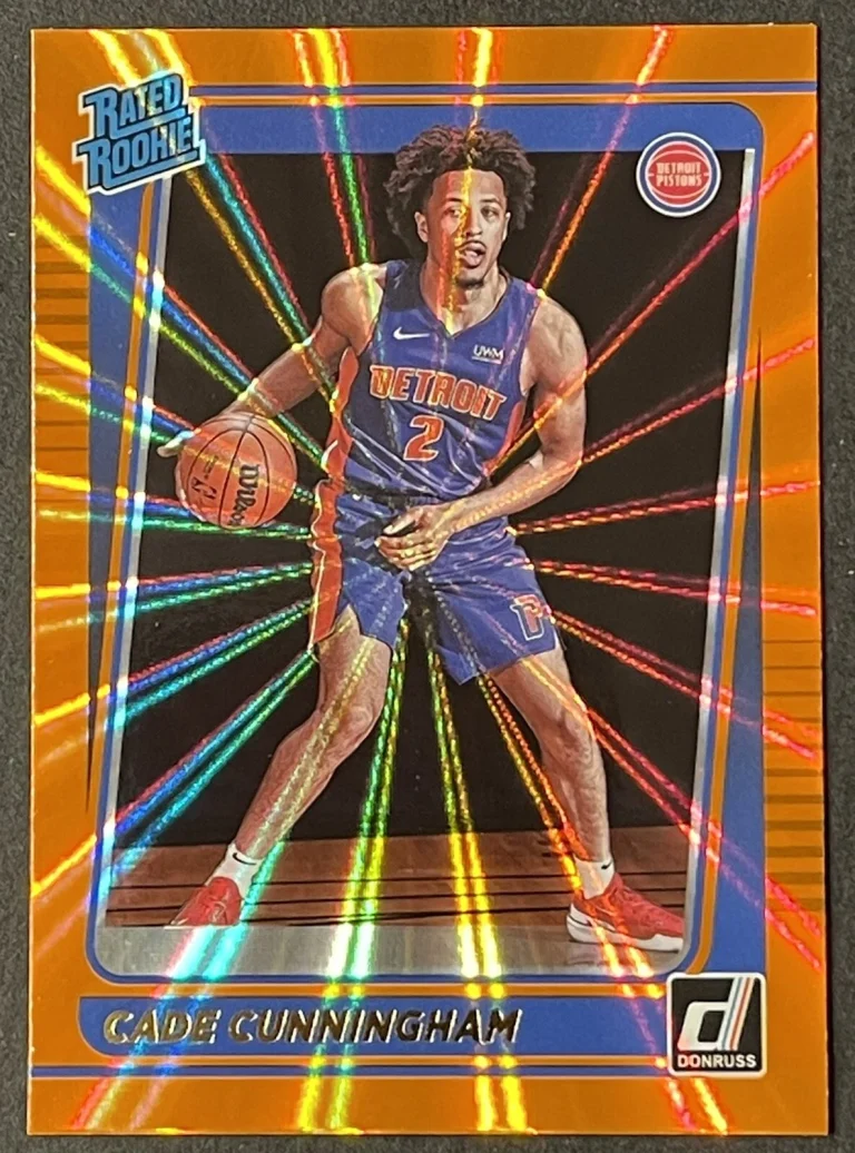 2021-22 Panini Donruss Cade Cunningham Rated Rookie RC Orange Laser #211 Pistons