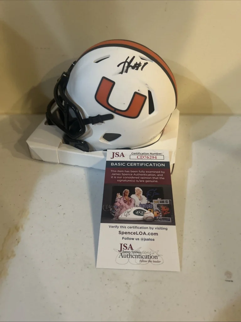 MIAMI HURRICANES- XAVIER RESTREPO SIGNED AUTOGRAPH MINI HELMET JSA COA THE U