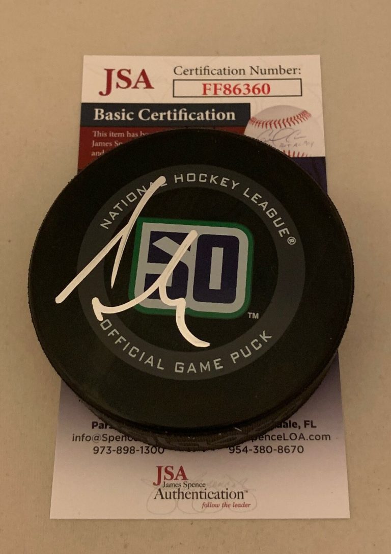 Alexander Edler signed Vancouver Canucks 50th Anniversary Game Puck JSA