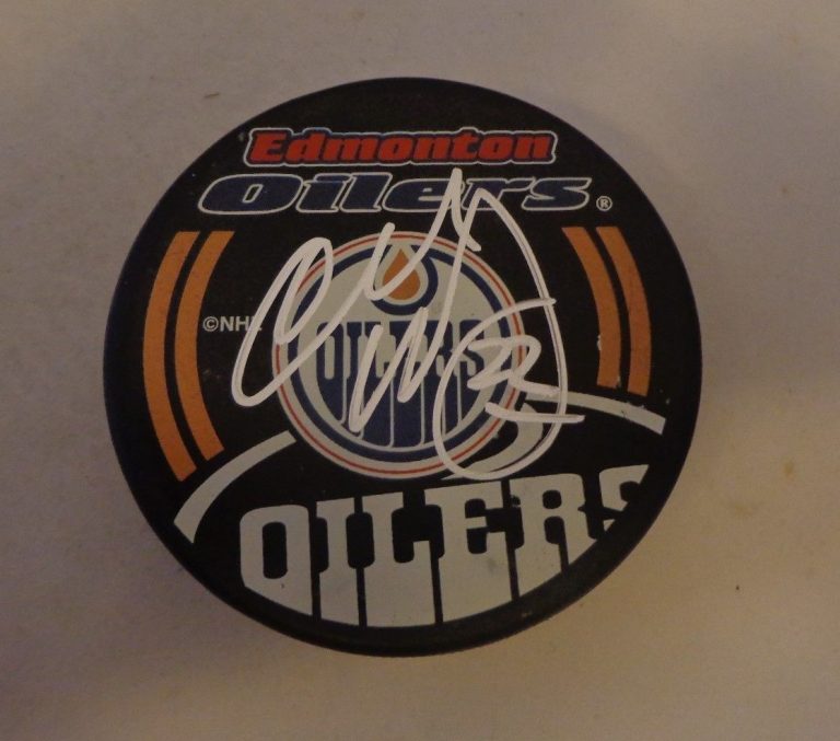 Charlie Huddy signed Edmonton Oilers puck autographed