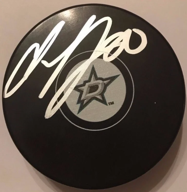 CODY EAKIN SIGNED DALLAS STARS PUCK W/CASE COA