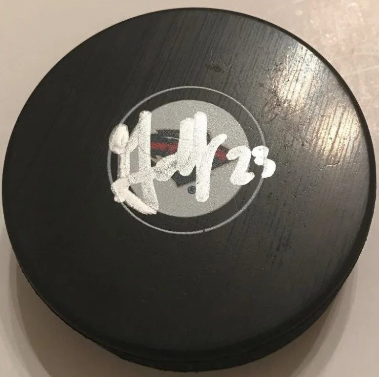 GUSTAV OLOFSSON SIGNED MINNESOTA WILD PUCK W/CASE COA
