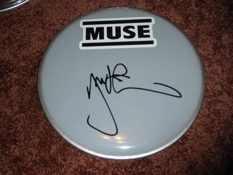 THE MUSE DOMINIC HOWARD SIGNED DRUMHEAD