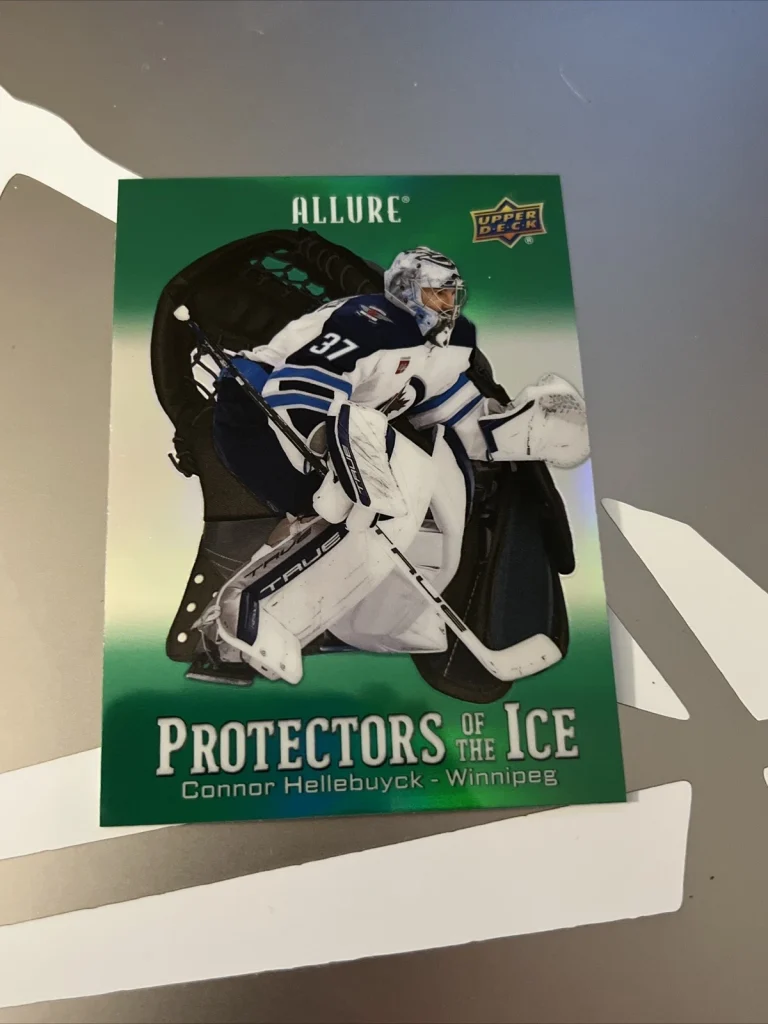2024-25 UD Synergy Protectors of the Ice Green PI-12 CONNOR HELLEBUYCK Jets Card