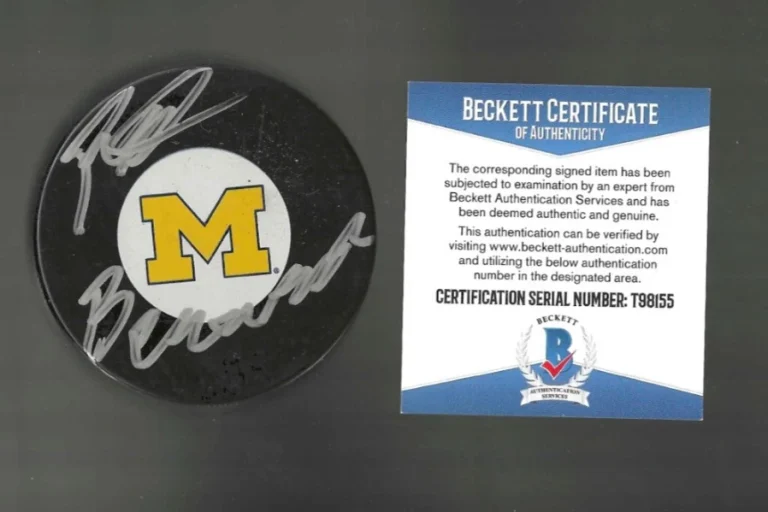 Red Berenson Signed Michigan Wolverines CCHA Yellow M Game Puck Beckett COA