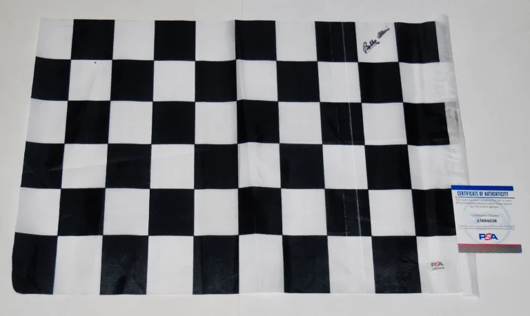 BOBBY ALLISON AUTOGRAPHED CHECKERED RACING FLAG (NASCAR HALL OF FAME) - PSA DNA!