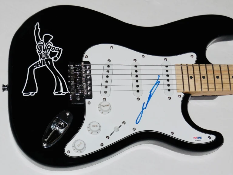 JOHN TRAVOLTA AUTOGRAPHED GUITAR (SATURDAY NIGHT FEVER) - PSA DNA!
