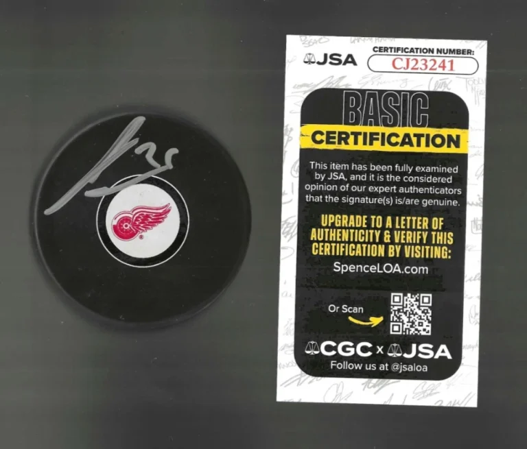 James van Riemsdyk Signed Detroit Red Wings Puck JSA COA