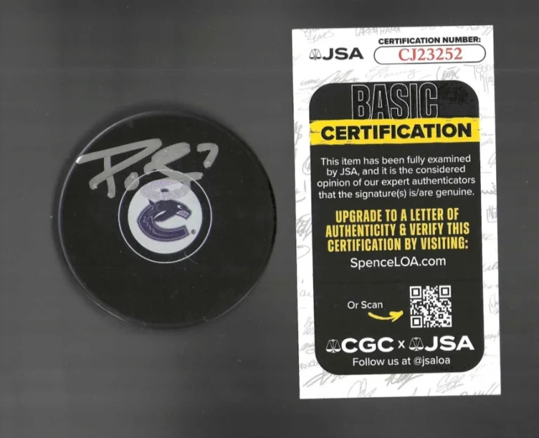 P.O. Joseph Signed Vancouver Canucks Puck JSA COA