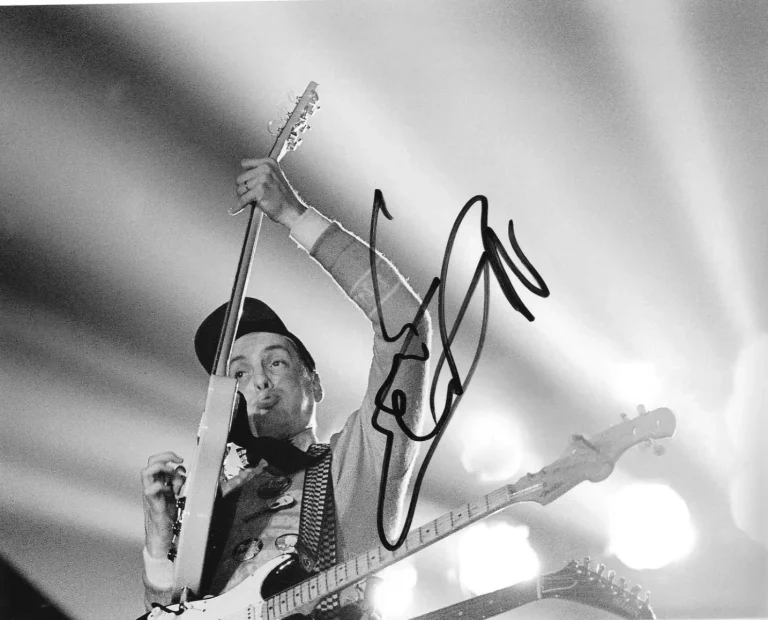 * RICK NIELSEN * signed 8x10 photo * CHEAP TRICK * COA *