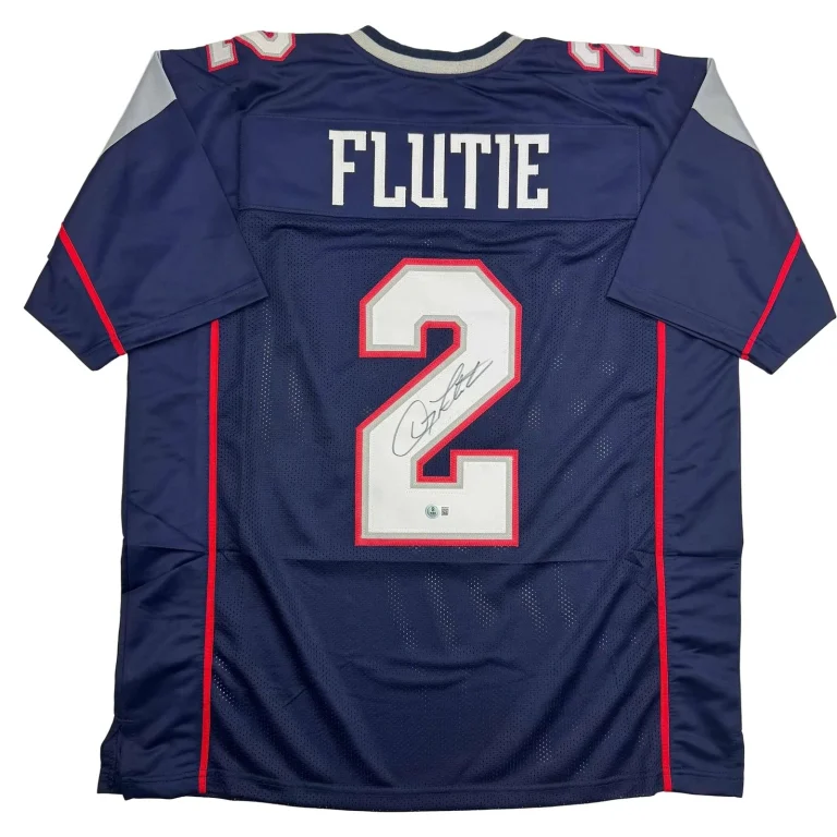 Autographed/Signed Doug Flutie New England Blue Jersey Beckett BAS COA