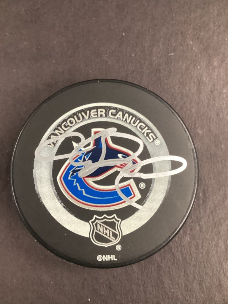 Markus Naslund Signed Hockey Puck NHL Vancouver Canucks Autograph TPG