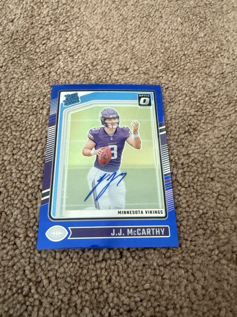 JJ McCarthy 2024 Donruss Optic Rated Rookie AUTO Blue Prizm /99 RC Vikings #235