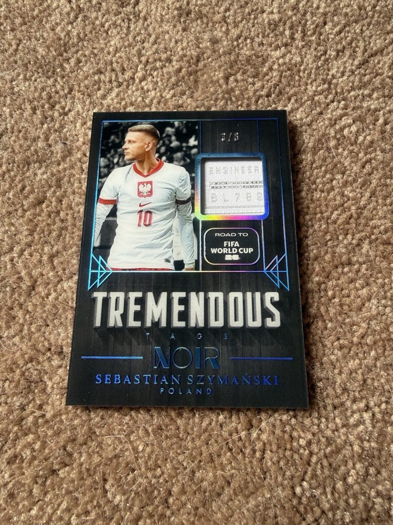 Sebastian Szymanski 2025-26 Panini Noir Tremendous Tags Laundry Tag /6 Poland
