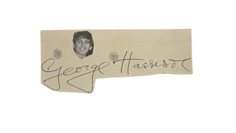George Harrison Signed Auto 1.5x3 Album Page The Beatles GRAD Authentication