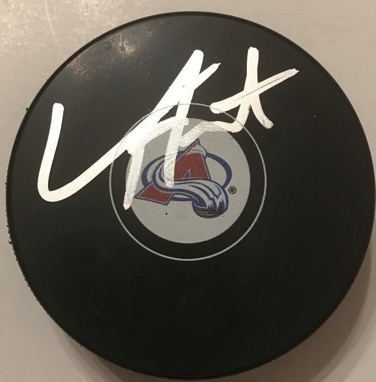 TYSON JOST SIGNED COLORADO AVALANCHE PUCK W/CASE COA