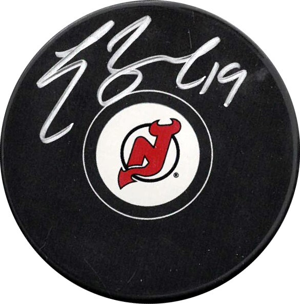 Travis Zajac signed New Jersey Devils Hockey Puck #19- Leaf Authentic Holo
