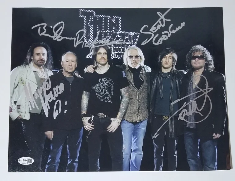 Thin Lizzy hand SIGNED 11x14