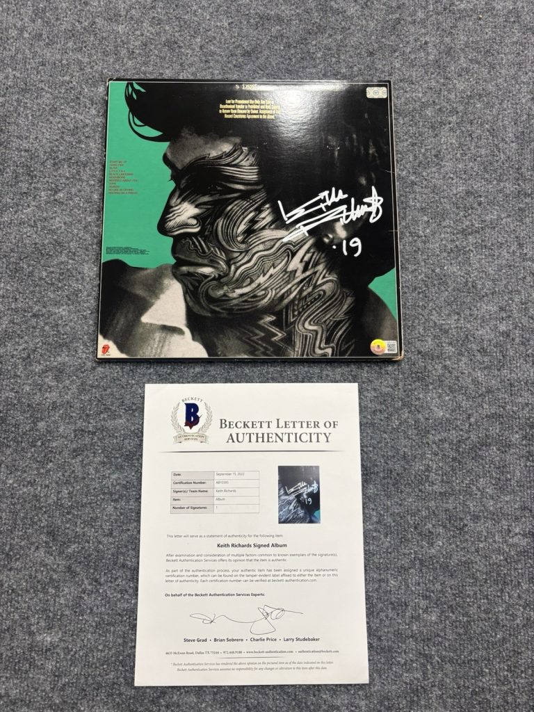 THE ROLLING STONES KEITH RICHARDS SIGNED AUTOGRAPHED TATTOO ALBUM  BECKETT LOA