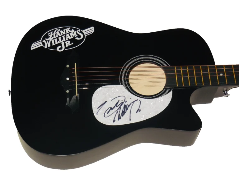 HANK WILLIAMS JR. AUTOGRAPHED ACOUSTIC GUITAR (BROCEPHUS) - W/ COA!